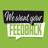 We want your FEEDBACK sign with green background